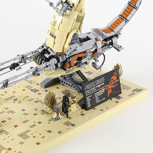 Kintan Strider Speeder Bike built using LEGO® bricks featured on a desert landscape with the Brick Wars UCS display plaque.