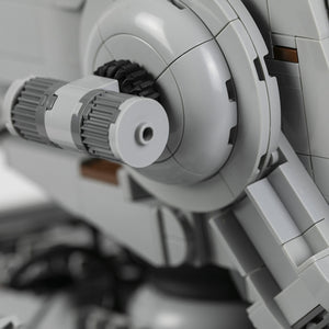Side profile of AT-ST canons with gears and components. 