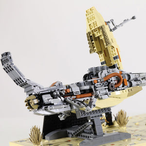 Side profile of the Kintan Strider Speeder bike engine with hood open showing exhaust ports and other ribbed hoses built with LEGO® bricks. 