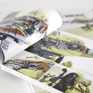 Opened manual of the Kintan Strider Speeder bike flipped to a gallery of images showcasing the Kintan Strider Speeder Bike from various angles. 